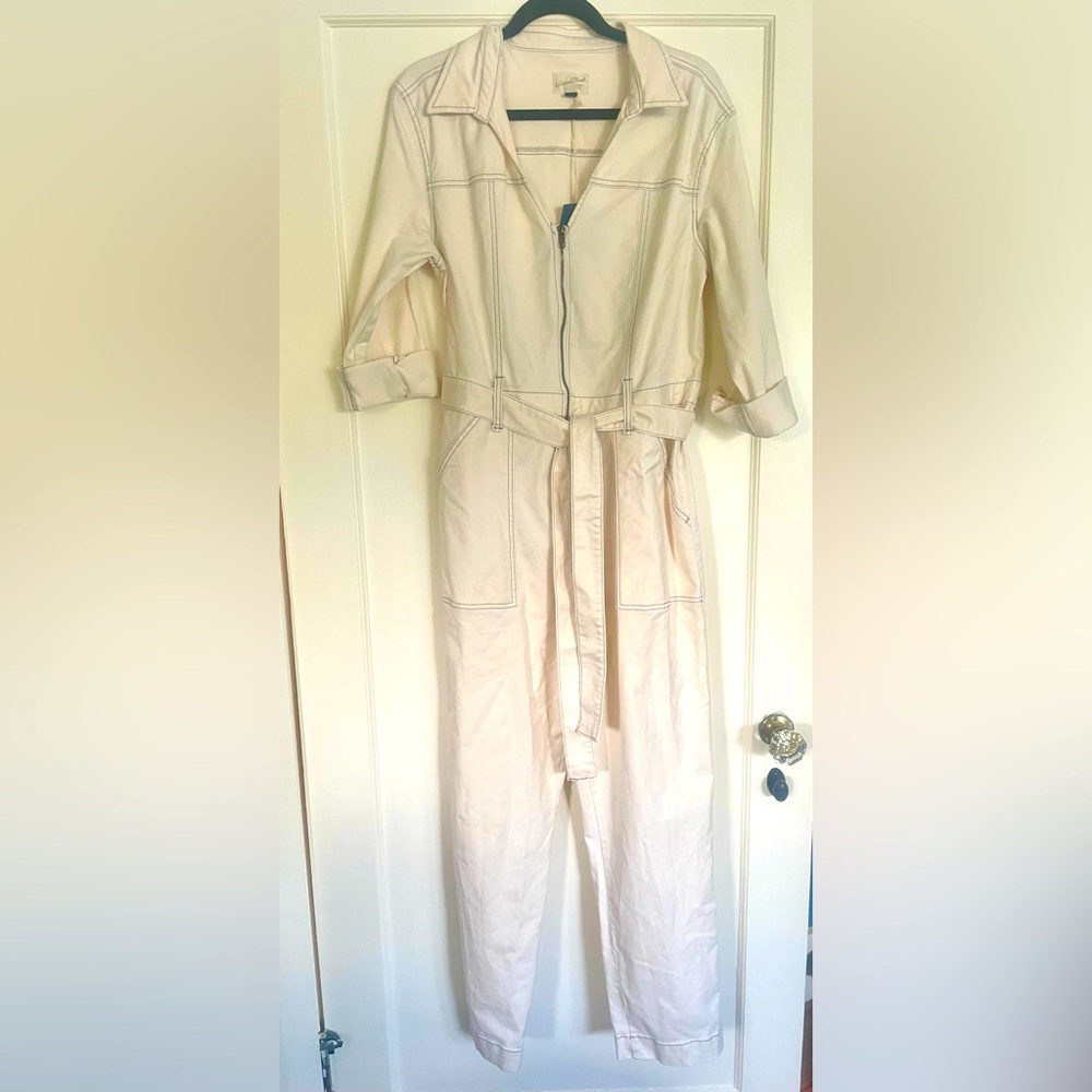 New, with tags, ivory twill cotton jumpsuit. Contrast navy stitching. Size 14